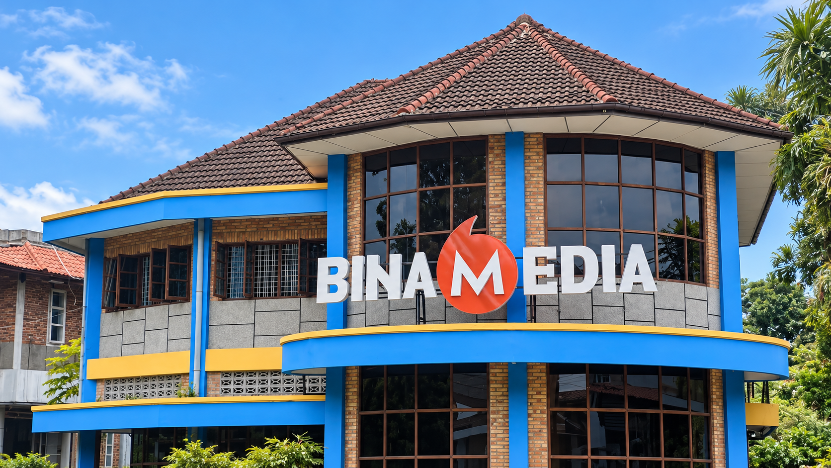 bina media building under blue skies